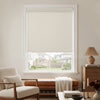 Beige plain weave blackout roller shade with no-drill installation.