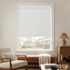 White Ashby no-drill blackout roller shade, a minimalist window treatment with plain weave fabric.