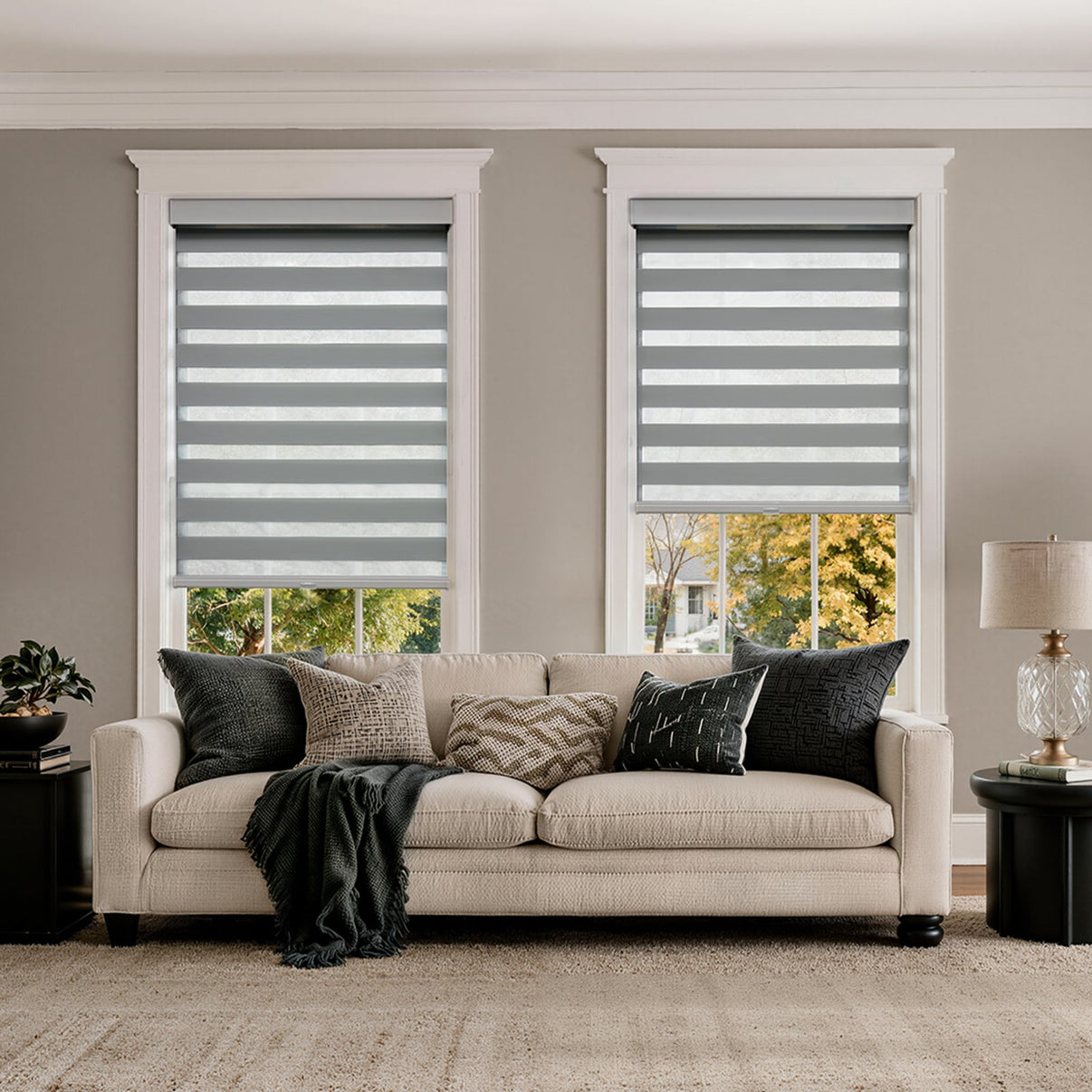 Parker light filtering dual layer zebra shades in gray on living room windows