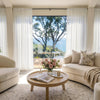 Joydeco Feather custom sheer curtains filtering sunlight in airy living room