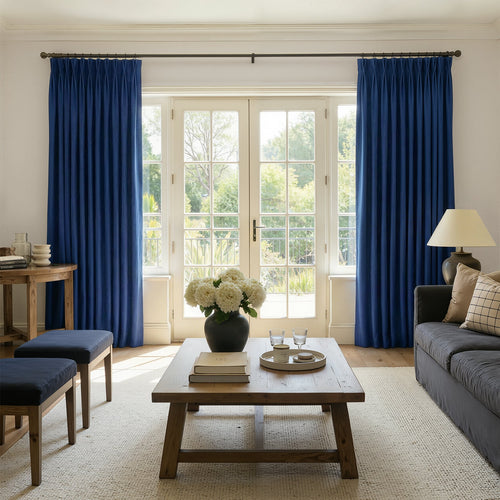Deep blue Sloane custom velvet curtains, room darkening, elegant pleats.
