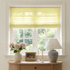 Rowan yellow light filtering Roman shade with natural slub linen blend texture, ideal window treatment.