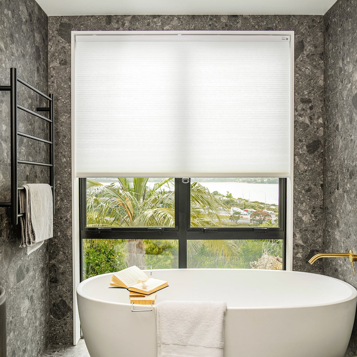 Solace Light Filtering Cellular Shade in white, controls soft light.