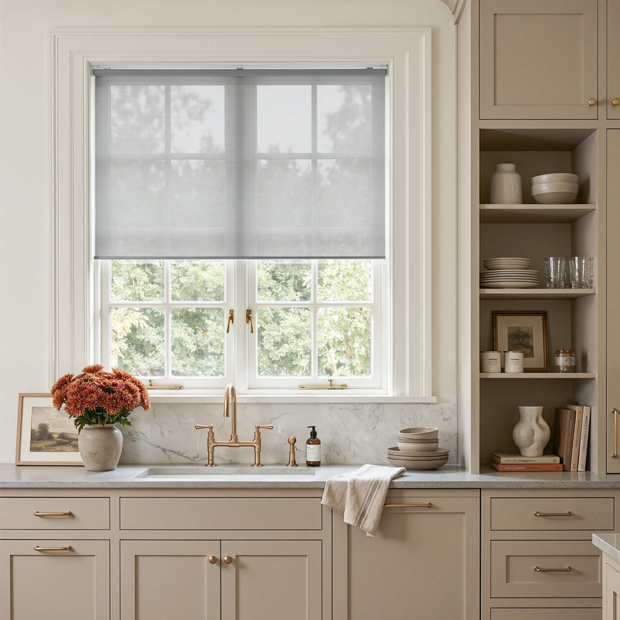 Joydeco Cove light filtering solar shade on a kitchen window, softening sunlight.