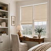 Beige linen blend blackout Roman shades on twin windows in a calm bedroom office