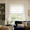 Natural beige linen Roman shade with soft light filtering and horizontal folds